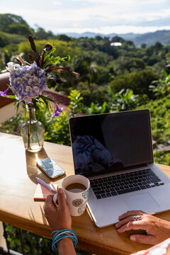 Hand with Coffee Cup 