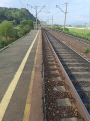 railway track, rails in the distance, road