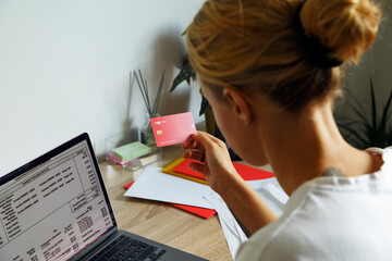 Woman paying taxes via netbook