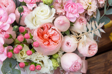 Floral backdrop, background, texture. Flowers in bloom. White pink bouquet with roses and peony close up, details	