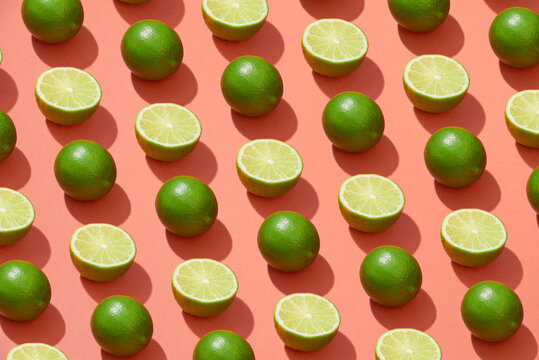 Creative pattern made of Fresh lime on pastel background.