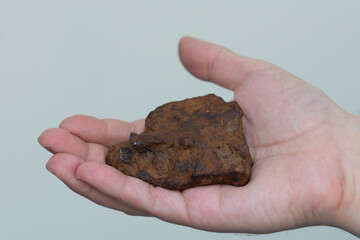 an iron meteorite in the palm ,Bistrita,Romania
