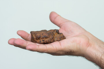 an iron meteorite in the palm ,Bistrita,Romania