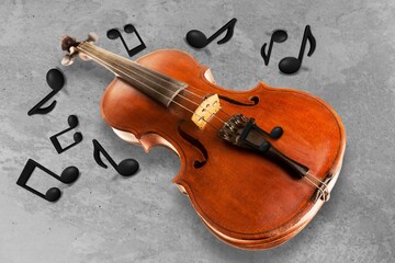 Classic Violin with music notes on desk background