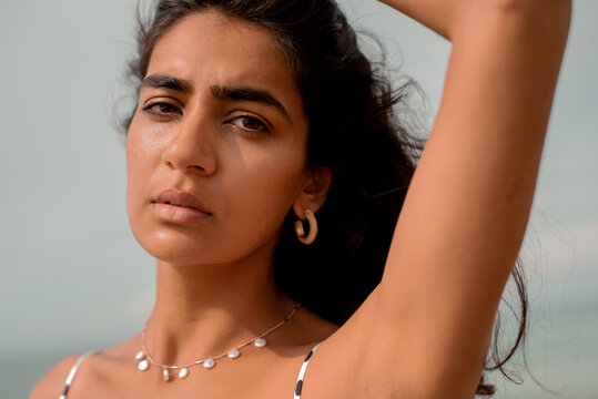 Golden earrings and shell circles for the necklace