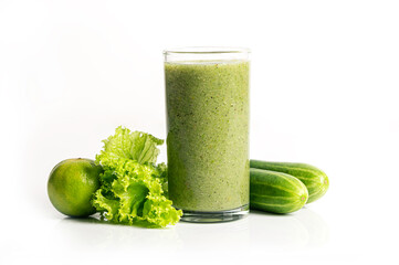 Glass with green healthy smoothies ,cucumber, lime, lettuce on white background.