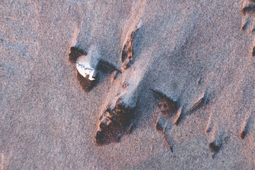 Beautiful details on the sand surface on sunset, Baltic Sea, Lithuania