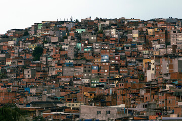 View of shacks in slum or favela in portuguese - Powered by Adobe