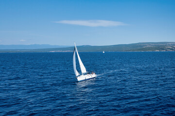 Coast of the Adriatic Sea in a resort in Croatia. Sailing yacht ride