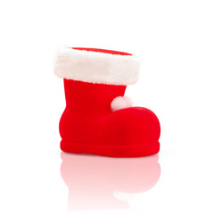 Obraz na płótnie Canvas Red and white santa's boot isolated on a white background seen from the side