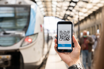 QR Code In Mobile Phone At Train Station