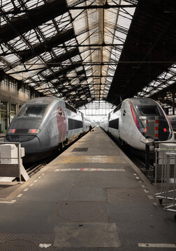 Two Trains At Train Station
