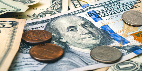Dollar and cents banknotes in closeup photo. New featured one hundred dollar bill. Economy,...