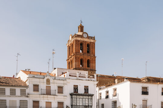 Tower of old church against sky in Zafra