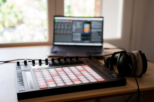 Music Studio desk with midi controller, headphones 