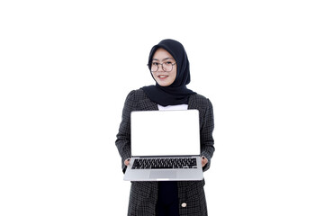 Young Asian Islam woman is showing screen when holding and working on laptop computer isolated white background