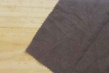 Wooden board and rustic cloth with space for text.