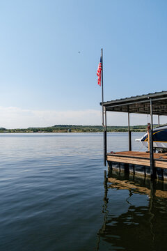 American Flag in Calm Beautiful Setting On Texas Lake
