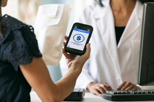 RX: Woman Uses Smart Phone To Pay