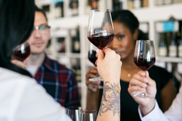 Wine: Customers Learn About Wine During A Sample Tasting