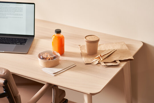 Takeaway lunch near laptop