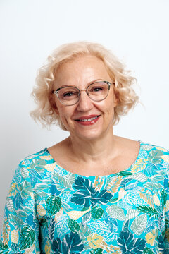 Smiling Middle Aged Woman Wearing Glasses Studio Shot