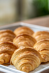 Delicious of freshly baked plain Croissant. Homemade French butter croissants.