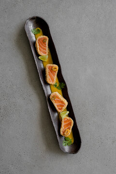 Cold cannelloni with escarole, cod and romesco salad