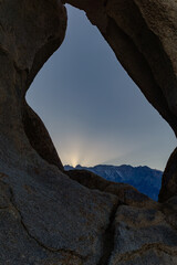 Sunset over the Sierras viewed through cyclops arch