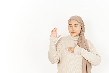 Swearing Gesture, Make an Oath  of Beautiful Asian Woman Wearing Hijab Isolated On White Background 