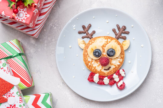 Funny food for kids. Reindeer pancake for  breakfast