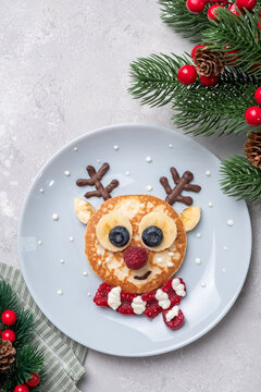 Naklejki Funny food for kids. Reindeer pancake for  breakfast