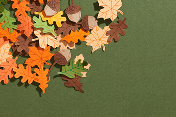brown acorns on autumn leaves