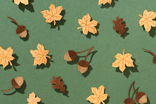 attern made of autumn dried leaves, nuts, acorns