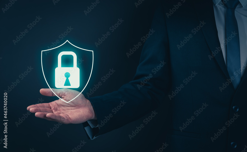 Poster businessman wearing black suit and hand holding interface online and icon key lock network connectio