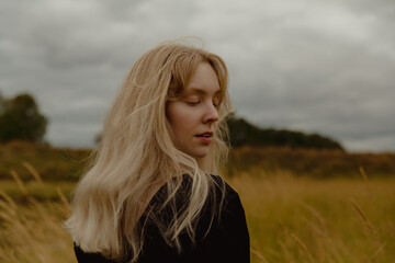 Young woman looking pensive