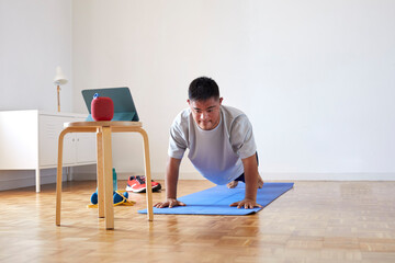 Man doing plank yoga pose