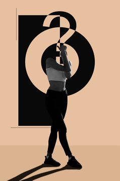 Headless woman standing against abstract background 