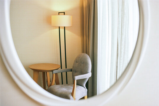 Mirror reflection of interior details of a hotel room