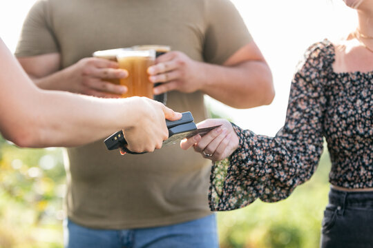 Beer: Woman Pays With Credit Card