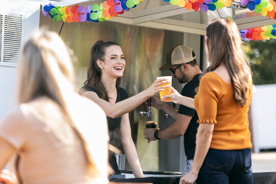 Bartender Serves Up Cold Draft Beer