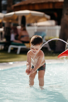 Boy playing in bool