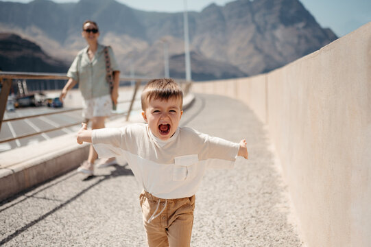 Funny baby screaming at camera.
