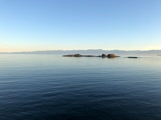 Beautiful calm ocean on Vancouver Island, BC. Oceanview sunset near downtown Victoria