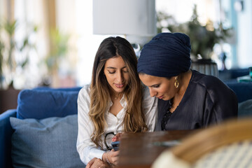 Muslims Women are using the smart phone 