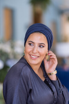 Portrait Of Smiling Muslim Woman In Hijab
