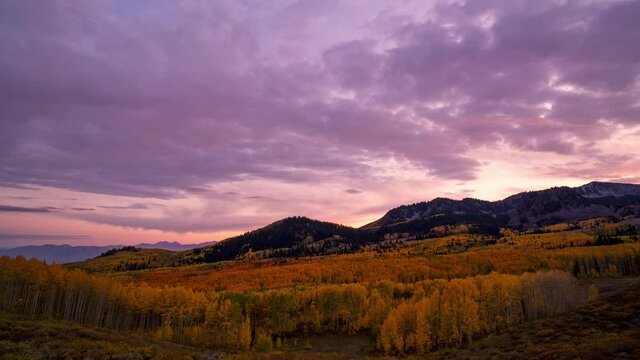 Sunset time-lapse over Aspen Tree forest in Utah from Bonanza Flats looking over Wasatch State Park.