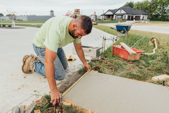 Worker measuring object. 