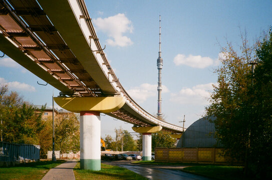 Highway overpass and a TV tower in the background