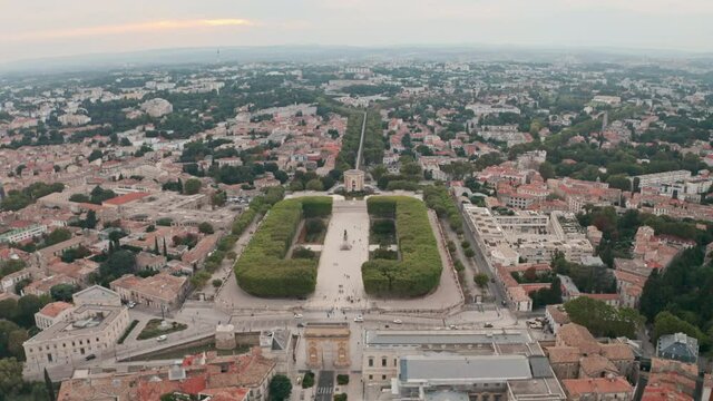 Dolly forward drone shot of Montpellier arc de triomphe
